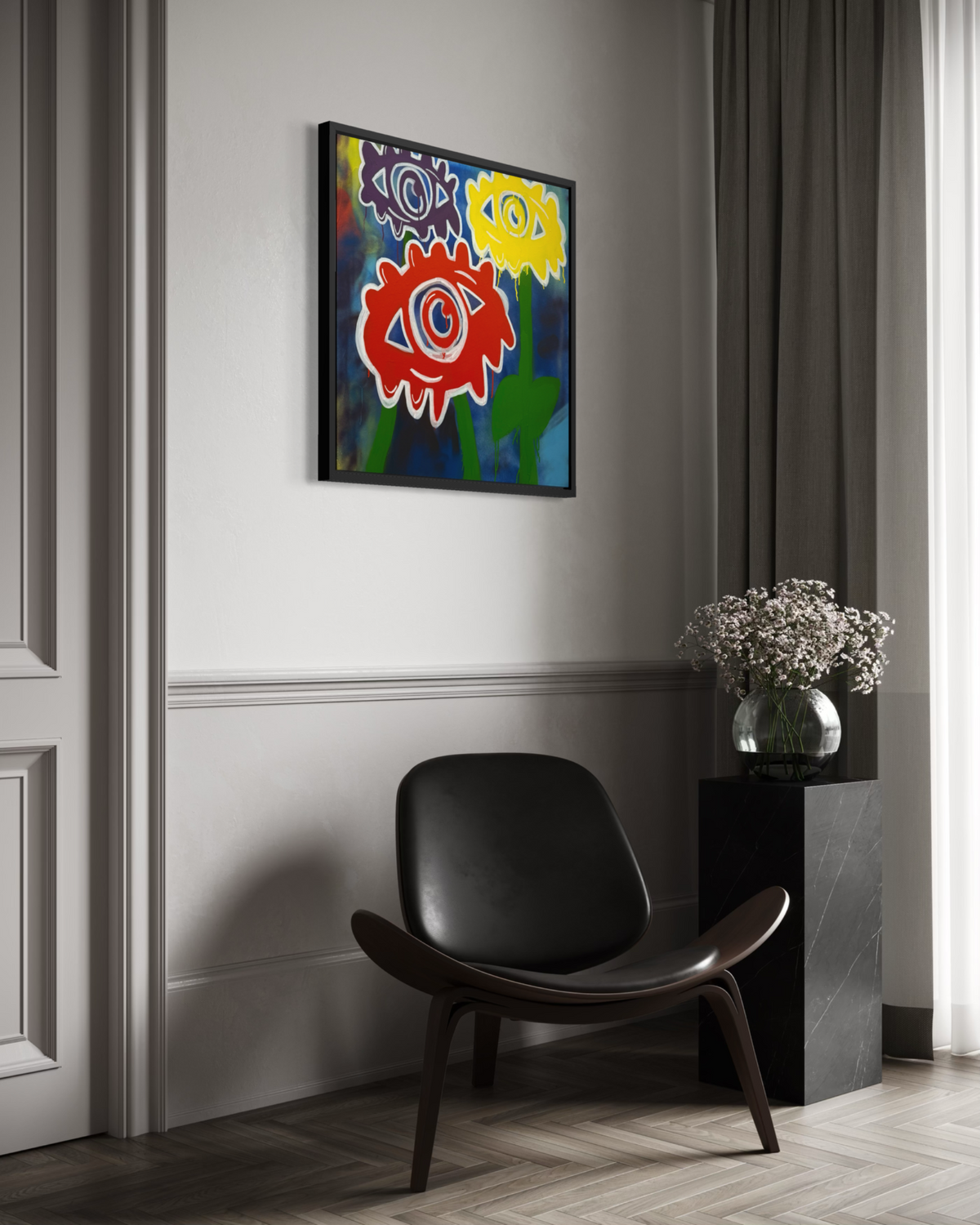 Adivino Gallery original colorful eye flower artwork displayed in a black frame above a modern chair
